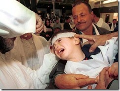 circ Ashoura child held down crying